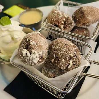 The Pupu House - Taro beignets, ice cream & frangelico honey sauce ($14.95) very good - Tiki Bars Near Me - Honolulu, Hawaii The Pupu House - Taro beignets, ice cream & frangelico honey sauce ($14.95) very good - Tiki Bars Near Me - Honolulu, Hawaii