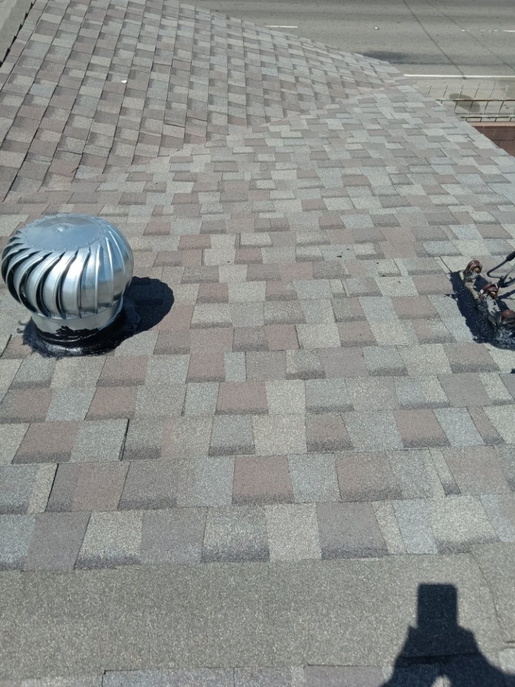 Slide of R & S All American Roofing