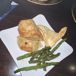 Egg rolls, garlic green beans, gyoza, and wonton.