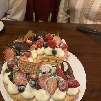 Saint Amon Baking - a cake with strawberries, blueberries, and chocolate - Bakeries Near Me - Tulsa, Oklahoma