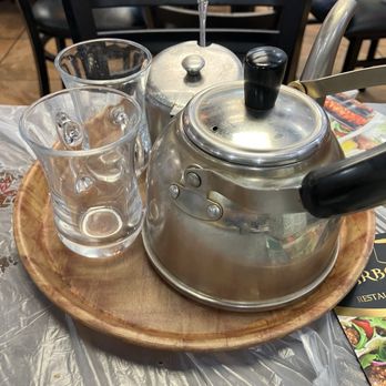 Tarbooch Restaurant & Cafe - Medium pot hot chai - Hookah Bars Near Me - West Palm Beach, Florida Tarbooch Restaurant & Cafe - Medium pot hot chai - Hookah Bars Near Me - West Palm Beach, Florida