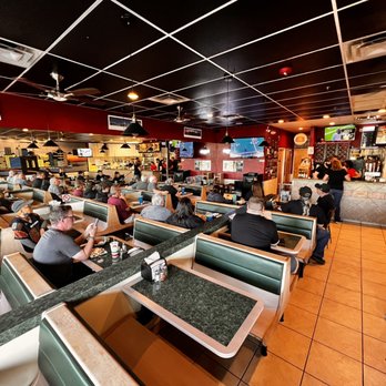Ray's Pizza - diners in a busy restaurant - Pizza Near Me - Peoria, Arizona Ray's Pizza - diners in a busy restaurant - Pizza Near Me - Peoria, Arizona