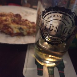 Freds Den - Crust wasn't crispy, but it's dive bar frozen pizza....if you're lookin for something else then go somewhere else. Want a pickled egg?