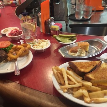 Junior's Restaurant - The amount of food you get with two sandwiches orders! Lots of sides, and large portions. - Bakeries Near Me - Brooklyn, New York
