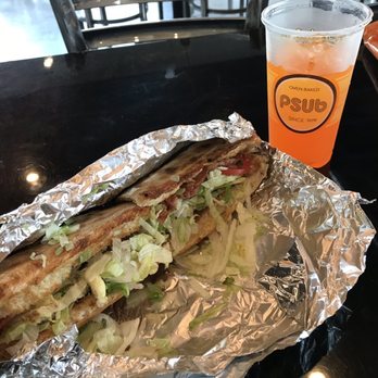 Planet Sub - a sandwich and a drink on a table - Sandwiches Near Me - Maryville, Missouri