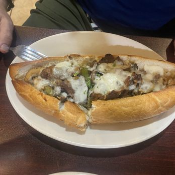 Moni's Pasta & Pizza - Philly Cheese Steak was my husband's dish. A little dry and could use more cheese. - Pizza Near Me - Arlington, Texas Moni's Pasta & Pizza - Philly Cheese Steak was my husband's dish. A little dry and could use more cheese. - Pizza Near Me - Arlington, Texas