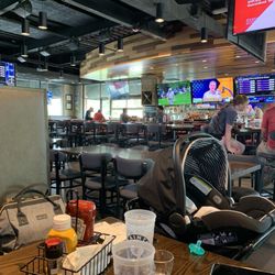 Saints Pub + Patio City Center - View of bar from booth