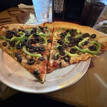 Satchel's Pizza - Two slices of - Pizza Near Me - Gainesville, Florida Satchel's Pizza - Two slices of - Pizza Near Me - Gainesville, Florida