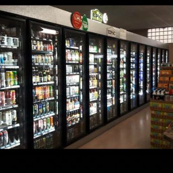 Oneida Liquors - a row of refrigerators in a store - Beer, Wine & Spirits Near Me - Denver, Colorado
