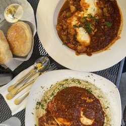 Cafe Olé - Hummus Shakshuka (bottom), Morrocan Shakshuka (top)