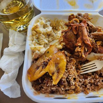 Tracey's Belizean Restaurant - a plate of food with rice and meat - Caribbean Near Me - Los Angeles, California Tracey's Belizean Restaurant - a plate of food with rice and meat - Caribbean Near Me - Los Angeles, California