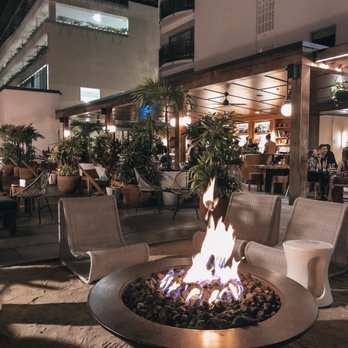 Hideout - Open seating area on the patio - Bars Near Me - Honolulu, Hawaii Hideout - Open seating area on the patio - Bars Near Me - Honolulu, Hawaii