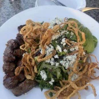 The Hudson - Steak and BLUE CHEESE salad. There's way more blue cheese underneath the actual salad. - Cocktail Bars Near Me - Sedona, Arizona The Hudson - Steak and BLUE CHEESE salad. There's way more blue cheese underneath the actual salad. - Cocktail Bars Near Me - Sedona, Arizona