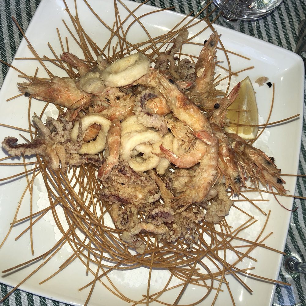 Papa Rex - Calamari & friend shrimp over friend pasta - Roman Near Me - Rome, RM Papa Rex - Calamari & friend shrimp over friend pasta - Roman Near Me - Rome, RM