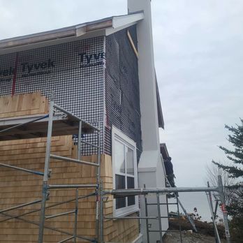 Hayley Construction - A maintenance free stucco color over the chimney - Stucco Services Near Me