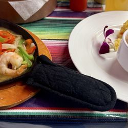 Shrimp fajitas, comes with rice, refried beans and tortillas.