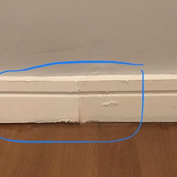 Agalliu Contracting - Baseboard not sanded down to smooth the wood prior to re-painting - General Contractors Near Me - New York, New York