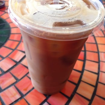 Mosaic Cafe - Iced vanilla latte with a double shot of espresso - Coffee & Tea Near Me - Asheville, North Carolina Mosaic Cafe - Iced vanilla latte with a double shot of espresso - Coffee & Tea Near Me - Asheville, North Carolina
