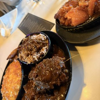 Caribbean Jerk Palace - Oxtails, rice and peas, mac and cheese and candied yams. - Caribbean Near Me - Houston, Texas