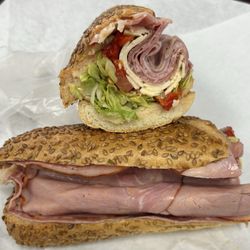 Reen's Delicatessen - The Cornaglia - Genoa salami, black pepper ham, capicola, prosciutto, provolone, roasted red peppers. Seeded Amoroso roll. Good