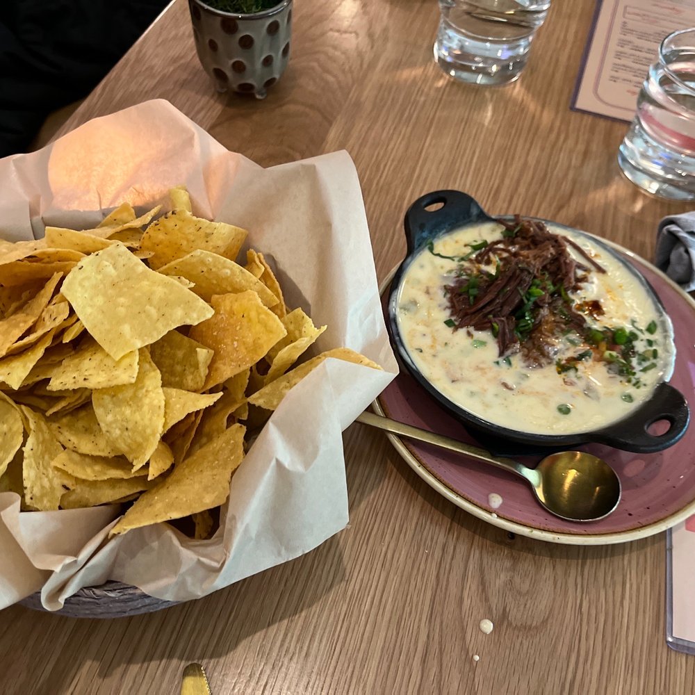 Lady Nomada - Mexican Kitchen - Warm queso with short rib - Mexican Near Me - Arvada, Colorado Lady Nomada - Mexican Kitchen - Warm queso with short rib - Mexican Near Me - Arvada, Colorado
