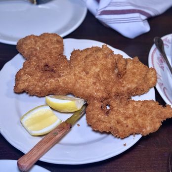 Alberta's Pizza - Cotoletta - signature extra large pork schnitzel w/ lemon - Pizza Near Me - Pittsburgh, Pennsylvania Alberta's Pizza - Cotoletta - signature extra large pork schnitzel w/ lemon - Pizza Near Me - Pittsburgh, Pennsylvania