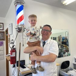 Mike & Jim's Barber Shop - Barber Jim and grandson Micah.