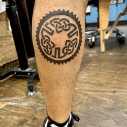 Brightside Tattoo Shop - Celtic design inside bike crank chainring