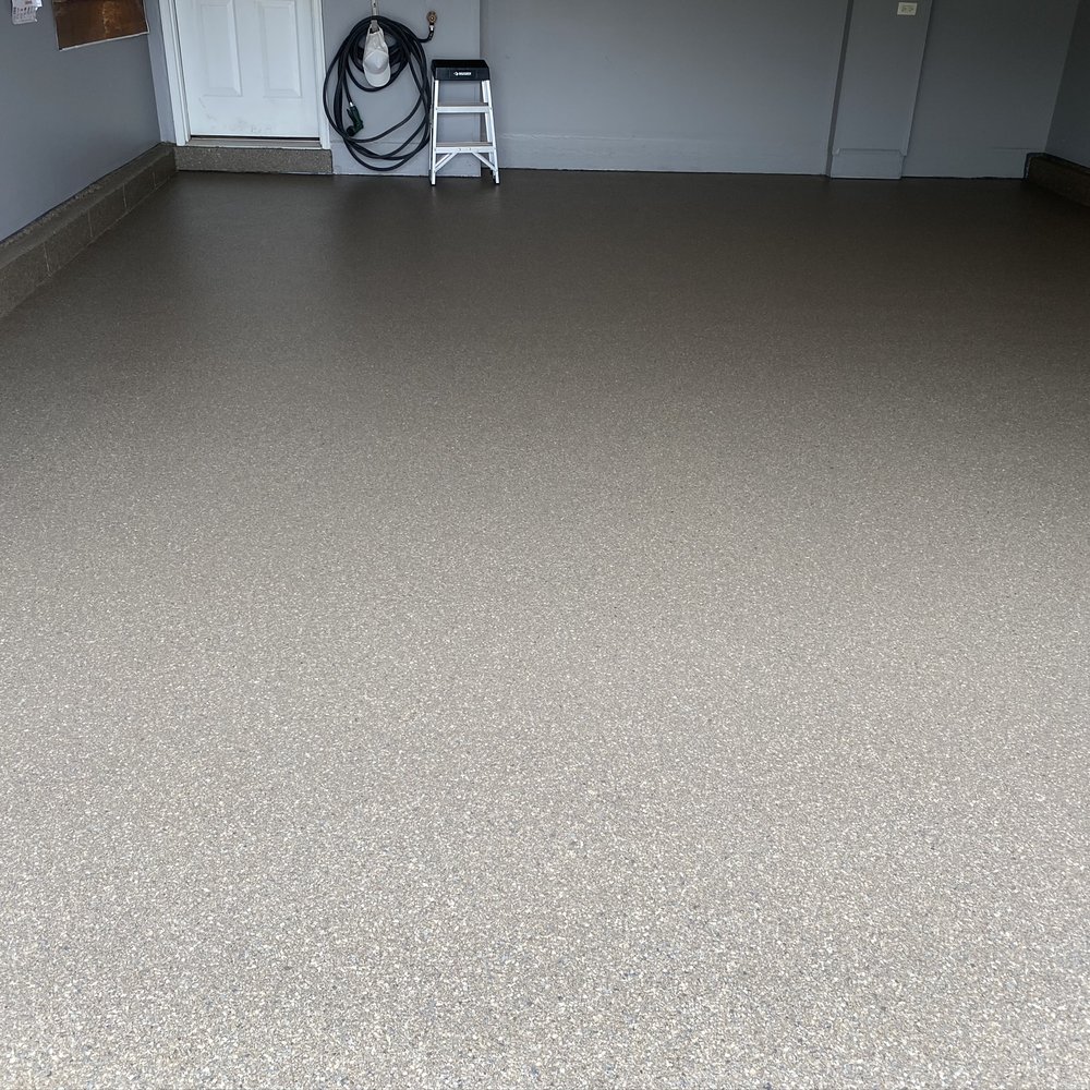 This is the garage floor Jim's crew epoxied. This is the garage floor Jim's crew epoxied.