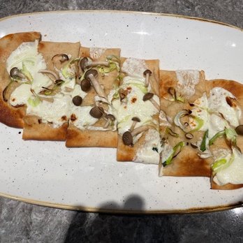Currant Bistro - flatbread of the day - truffle mozzarella cheese with mushrooms. delish! - New American Near Me - Seattle, Washington