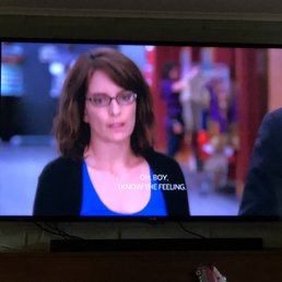 Tv on living room wall