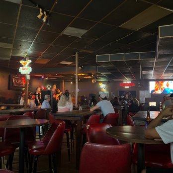 Parmer Lane Tavern - people sitting at the bar - Sports Bars Near Me - Austin, Texas Parmer Lane Tavern - people sitting at the bar - Sports Bars Near Me - Austin, Texas