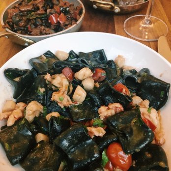 Oretta - Squid ink pasta with Caponata di Melanzane on the side and some roasted potatoes. - Italian Near Me - Toronto, Ontario Oretta - Squid ink pasta with Caponata di Melanzane on the side and some roasted potatoes. - Italian Near Me - Toronto, Ontario