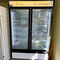 The Cakery - Refrigerator of cinnamon rolls, breads, apple crisp, muffins, etc.