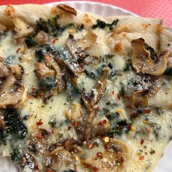 Cheesy Pizza - a slice of pizza on a paper plate - Pizza Near Me - New York, New York Cheesy Pizza - a slice of pizza on a paper plate - Pizza Near Me - New York, New York