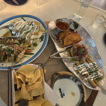 Sol Y Luna - Ahi tuna, quesabirria, Shredded Beef Flautas, Chicken Chilaquiles, Cilantro Mint Chicken Skewers - Latin American Near Me - Mountain Brook, Alabama Sol Y Luna - Ahi tuna, quesabirria, Shredded Beef Flautas, Chicken Chilaquiles, Cilantro Mint Chicken Skewers - Latin American Near Me - Mountain Brook, Alabama