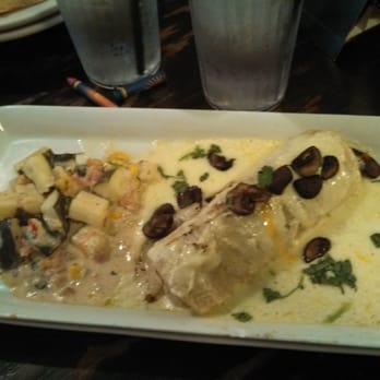 El Charro Cafe - Grilled chicken and Crimini mushroom enchilada with calabacitas - Tacos Near Me - Tucson, Arizona