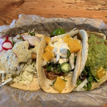Tacovore - Blackened fish taco on the left, Carnitas with mango in the center and Carne Asada with guacamole on the right - Tacos Near Me - Portland, Oregon