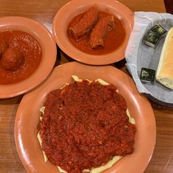 Rigatoni's Pizzeria & Italian Restaurant - Penne, meatballs, sausage, complimentary bread.