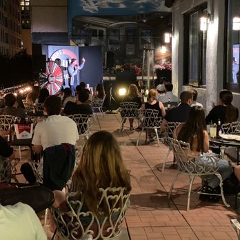 The Comedy Bar - a crowd of people sitting outside - Comedy Clubs Near Me - Chicago, Illinois