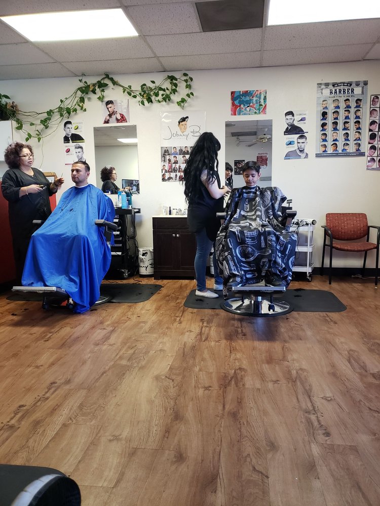 Barber Shop Chronicles Logo