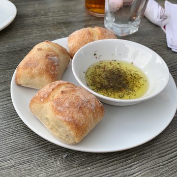 Evviva Trattoria - Bread and oil. Delish! - Italian Near Me - Maynard, Massachusetts
