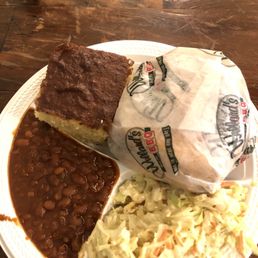 Sandwich and sides (beans and coleslaw) Sandwich and sides (beans and coleslaw)
