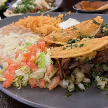 La Corona Bar & Grill - Tacos De Barbacoa - Guadalajara style red tacos, served with shredded beef and grilled onions - Sports Bars Near Me - Van Nuys, California La Corona Bar & Grill - Tacos De Barbacoa - Guadalajara style red tacos, served with shredded beef and grilled onions - Sports Bars Near Me - Van Nuys, California