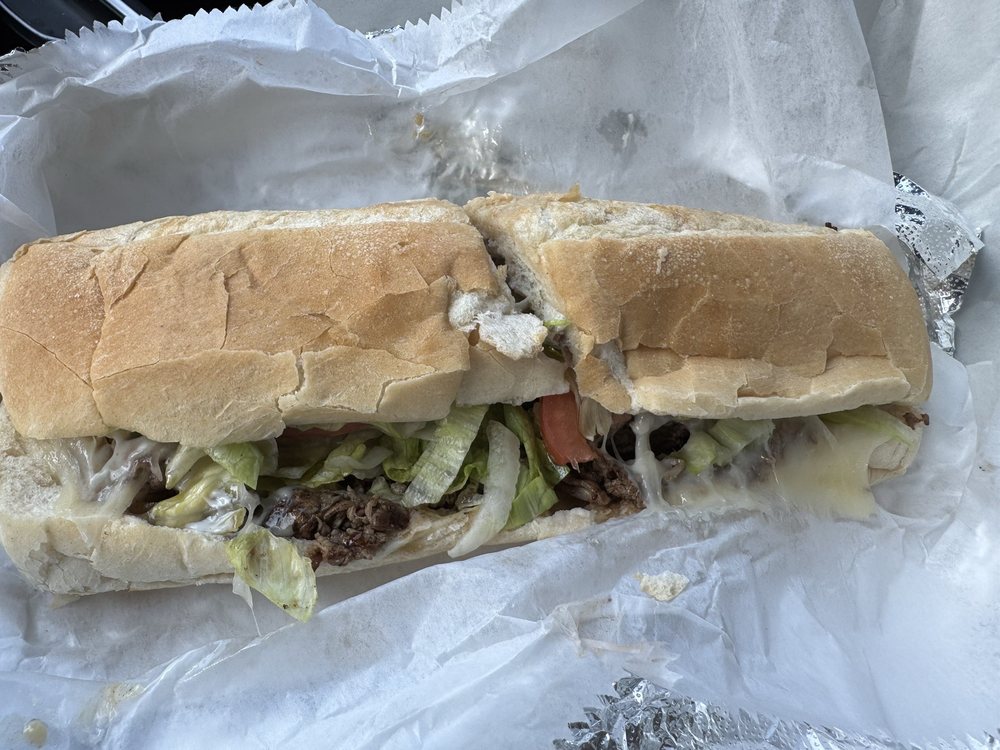 Sam's Pizza & Subs Logo