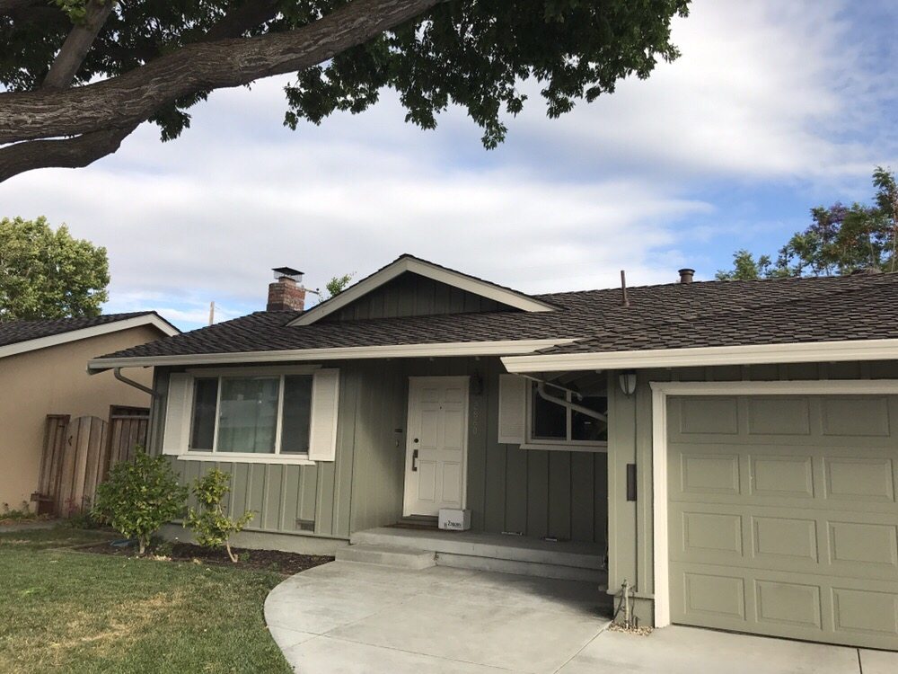 Slide of Caruzo's Roofing Contractors