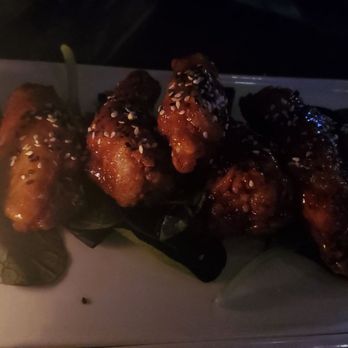 Prime39 - Sticky wings with light dusting of sesame seeds - New American Near Me - Lynbrook, New York Prime39 - Sticky wings with light dusting of sesame seeds - New American Near Me - Lynbrook, New York