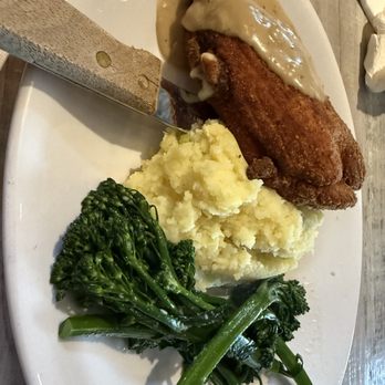 Blue Moon Beach Grill - Crispy fried chicken breast stuffed with prosciutto ham and provolone cheese. Served with roasted garlic and scallion mashed potatoes. - Seafood Near Me - Nags Head, North Carolina