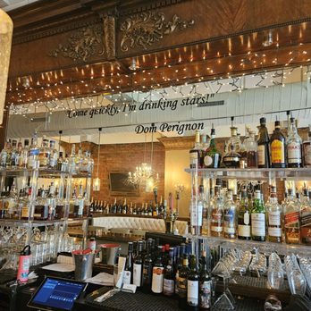 Corridor 44 - Inscription on bar mirror by Dom Perignon - Champagne Bars Near Me - Denver, Colorado