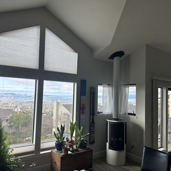 Berkeley Heat - Living room with cool fireplace in the corner - Hot Tub & Pool Near Me - Berkeley, California